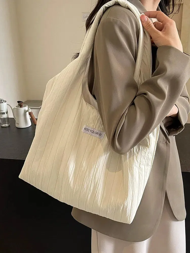 Inscription Quilted Tote Bag